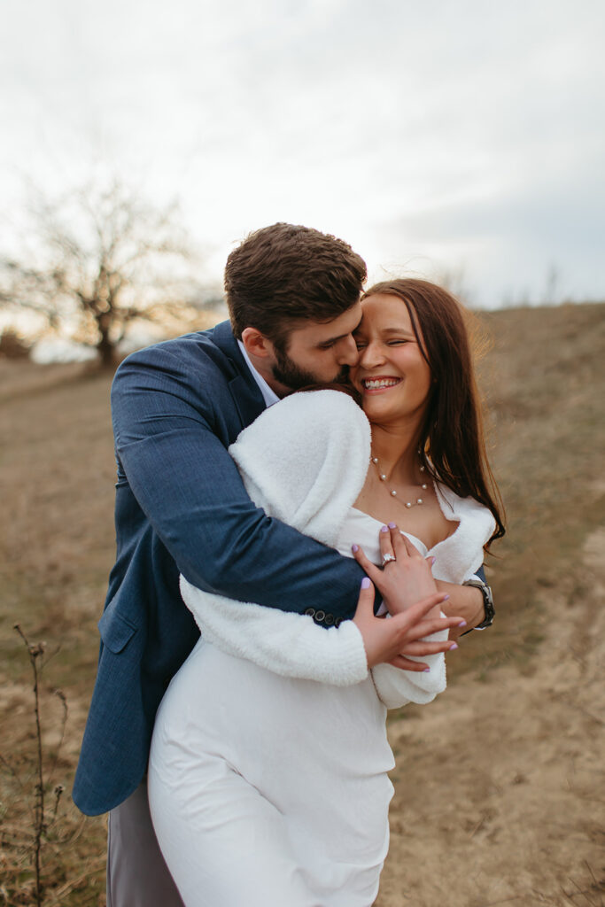 couple proving why you need engagement photos