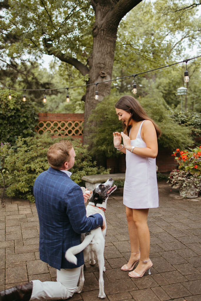 An emotional surprise proposal in a stunning backyard garden