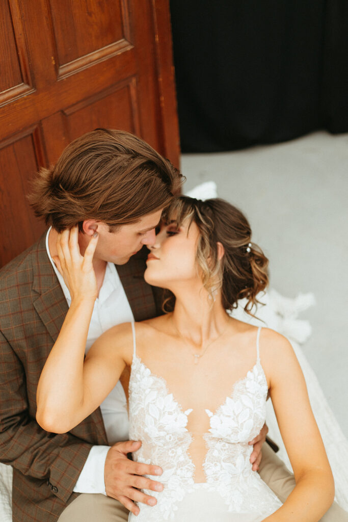 Bride and groom portraits in the greenhouse at Atreeum in Wichita