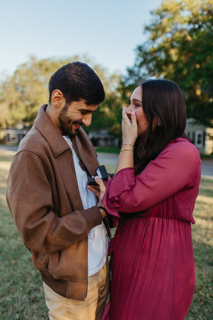 A proposal takes place during a planned couples photoshoot