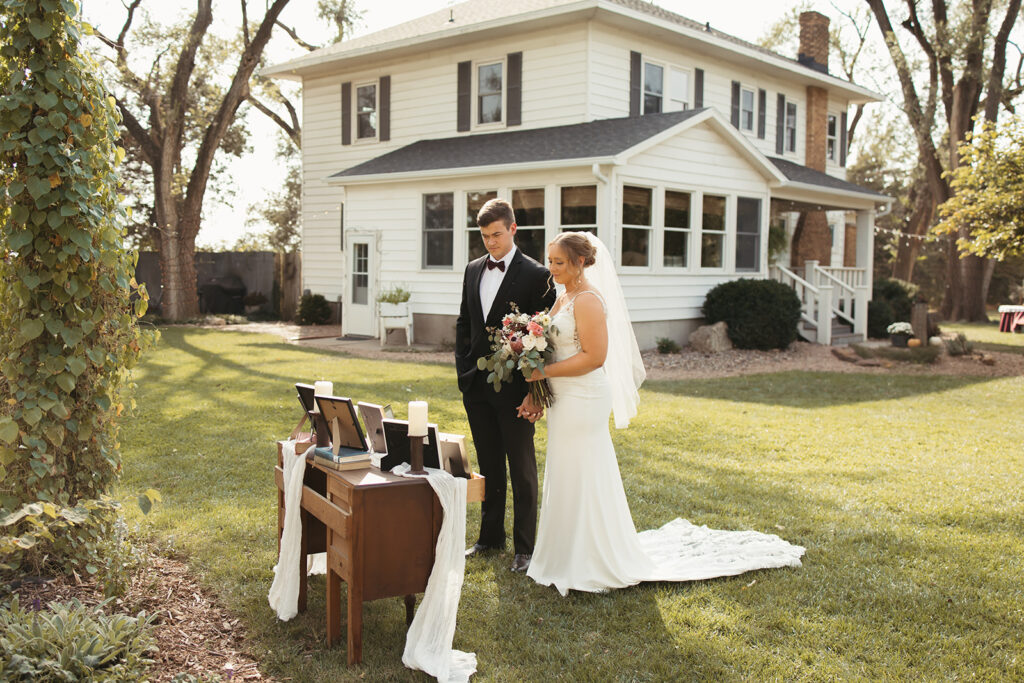 Bride and groom honor their loved ones at the memorial table