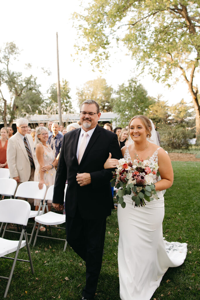 An outdoor backyard wedding ceremony near Wichita, Kansas