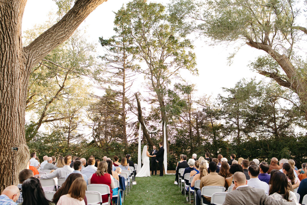 An outdoor backyard wedding ceremony near Wichita, Kansas