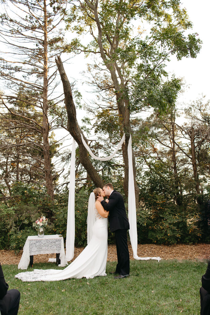 An outdoor backyard wedding ceremony near Wichita, Kansas