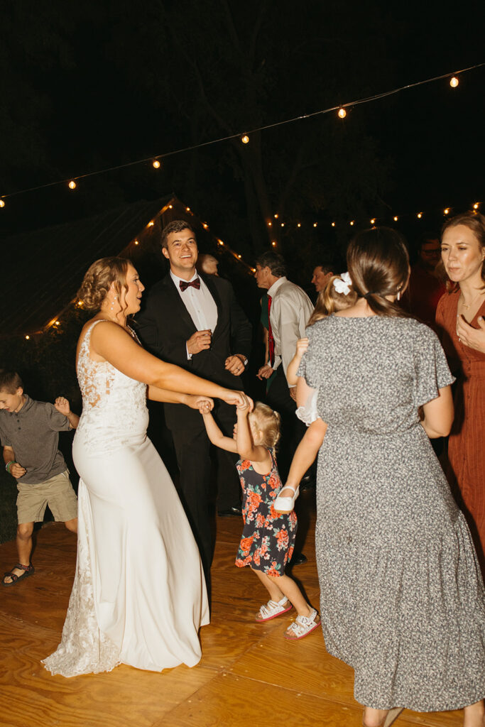 An outdoor backyard wedding reception near Wichita, Kansas