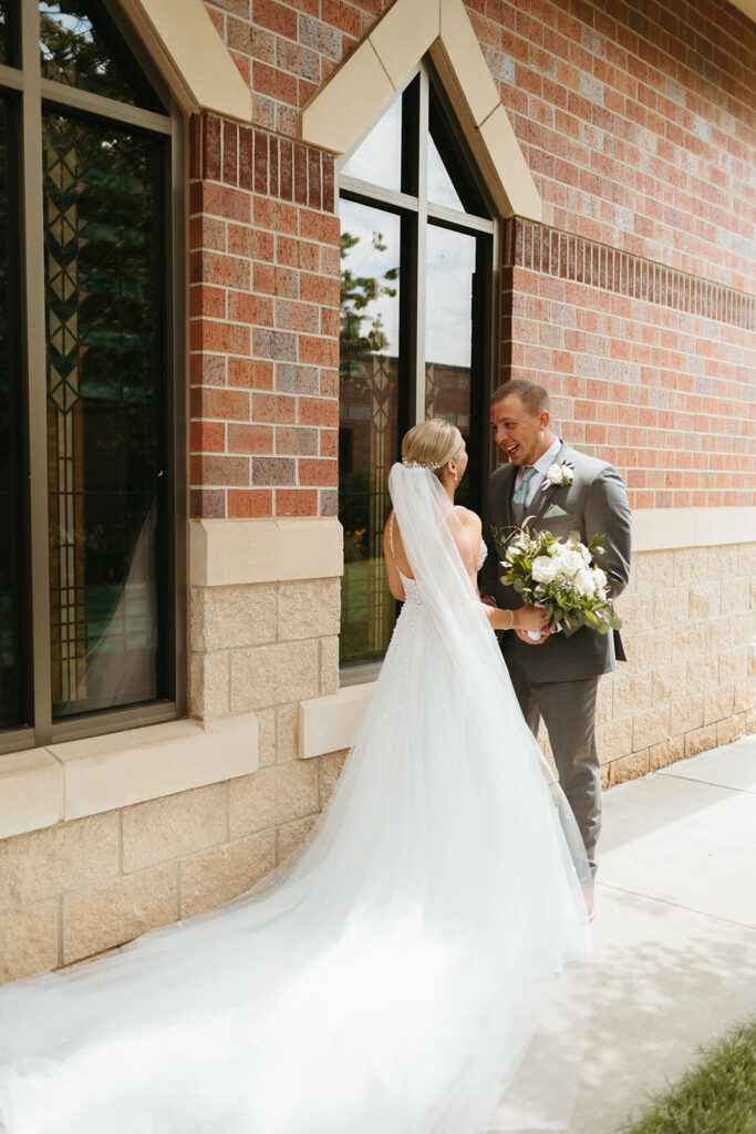 Wedding photographer captures first look moment