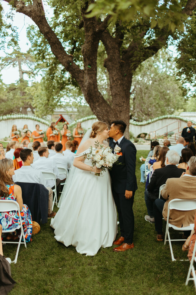 A wedding planner ensures the wedding ceremony starts and flows as planned