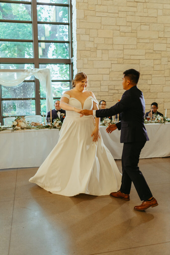 A wedding planner assists with the timeline of the wedding reception and cueing music